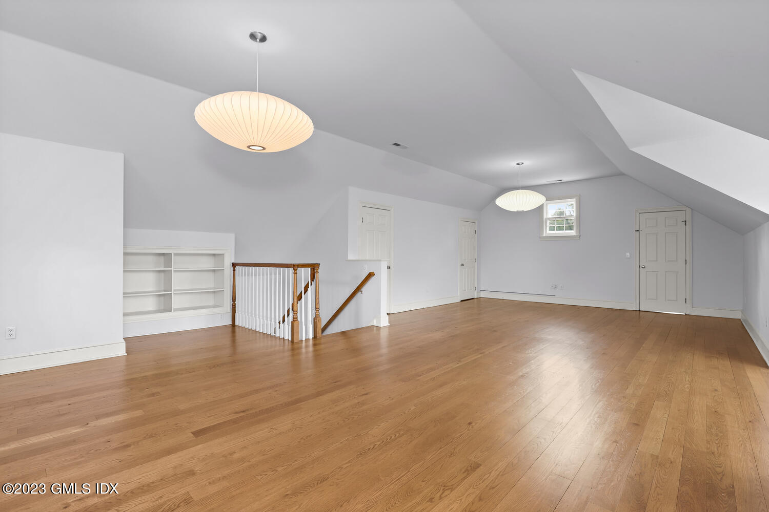 31 Fairfield Road Greenwich, CT 06830 - Photo 17 of 28 an empty room with wooden floor and window