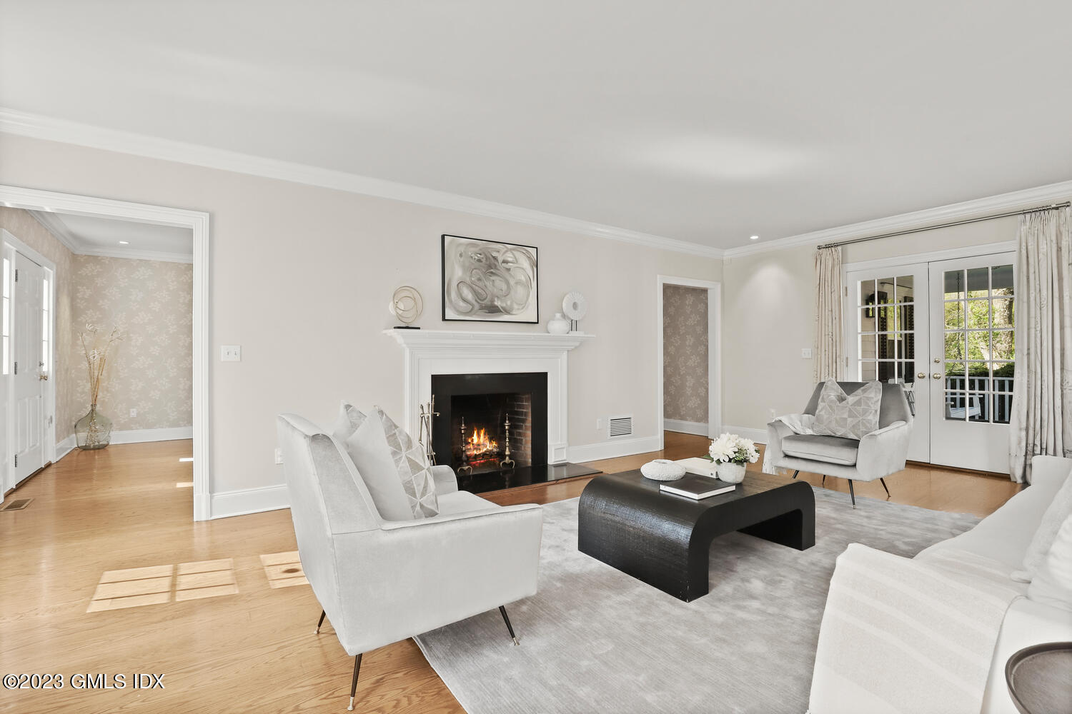 31 Fairfield Road Greenwich, CT 06830 - Photo 4 of 28 a living room with furniture and a fireplace