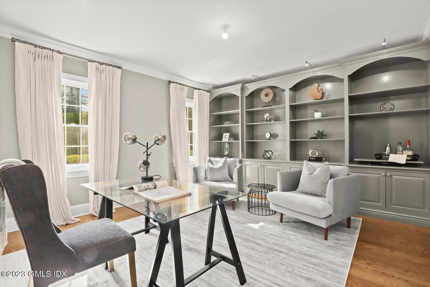 31 Fairfield Road Greenwich, CT 06830 - Photo 7 of 28 a living room with furniture and a large window