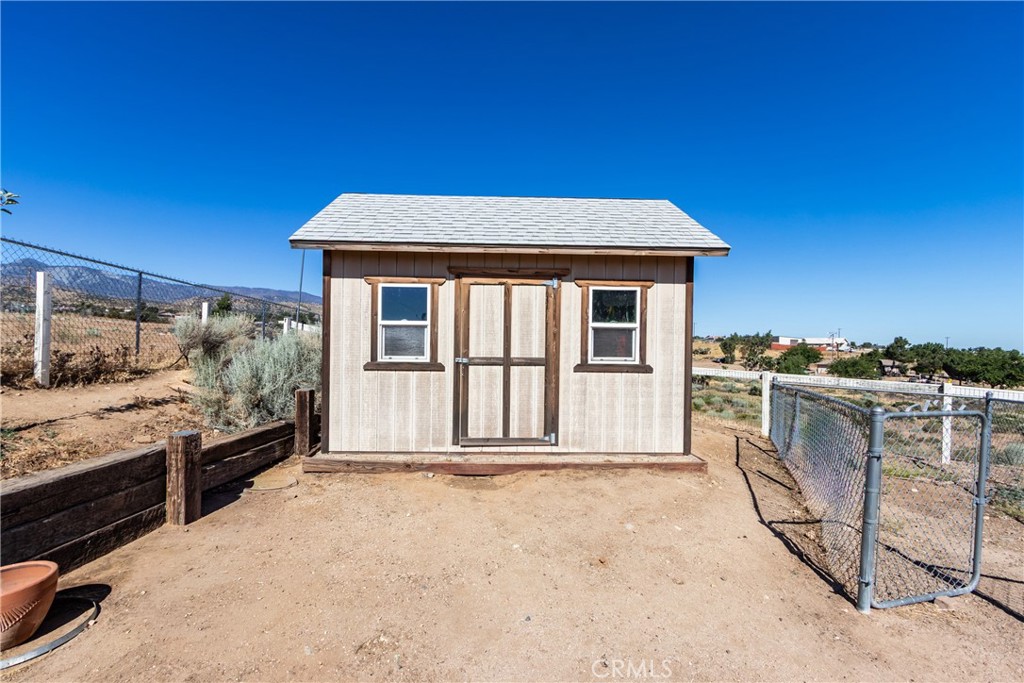 8650 Cowberry Road Phelan, CA 92371 - Photo 63 of 66 Shed for extra storage in the backyard