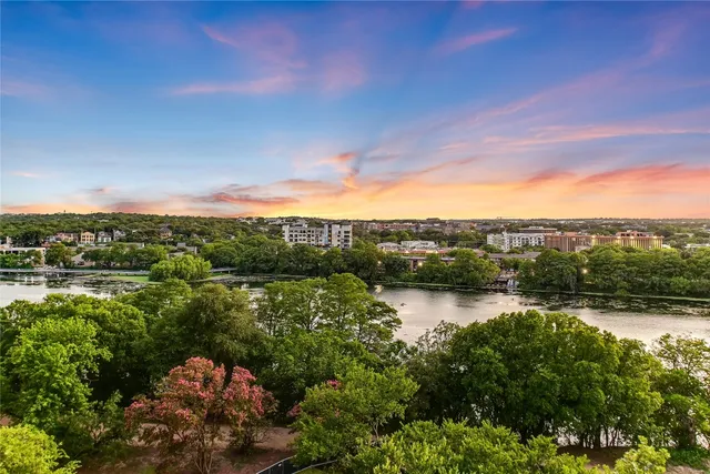 a view of lake with green space