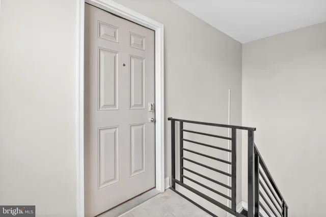 a view of a hallway with entryway