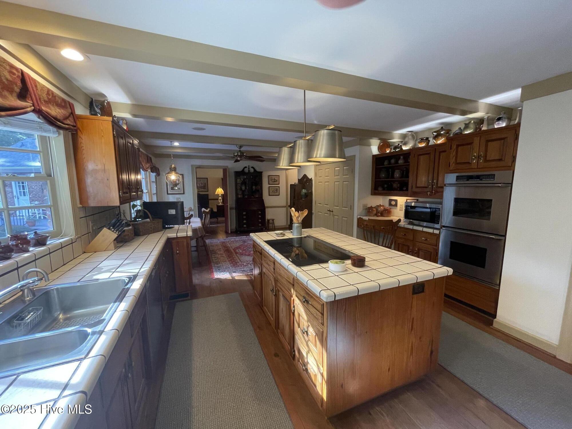 80 Wilson Road Pinehurst, NC 28374 - Photo 22 of 74 Kitchen Island