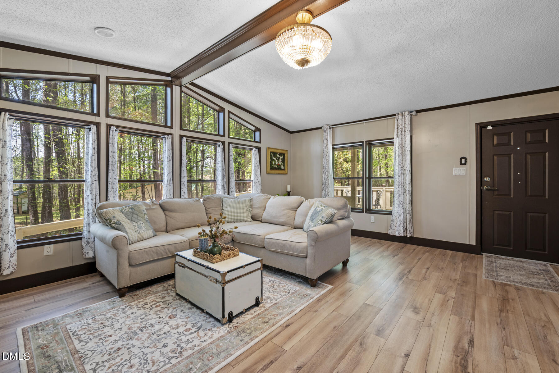 492 Little Mill Road Henderson, NC 27537 - Photo 7 of 39 a living room with furniture and a large window