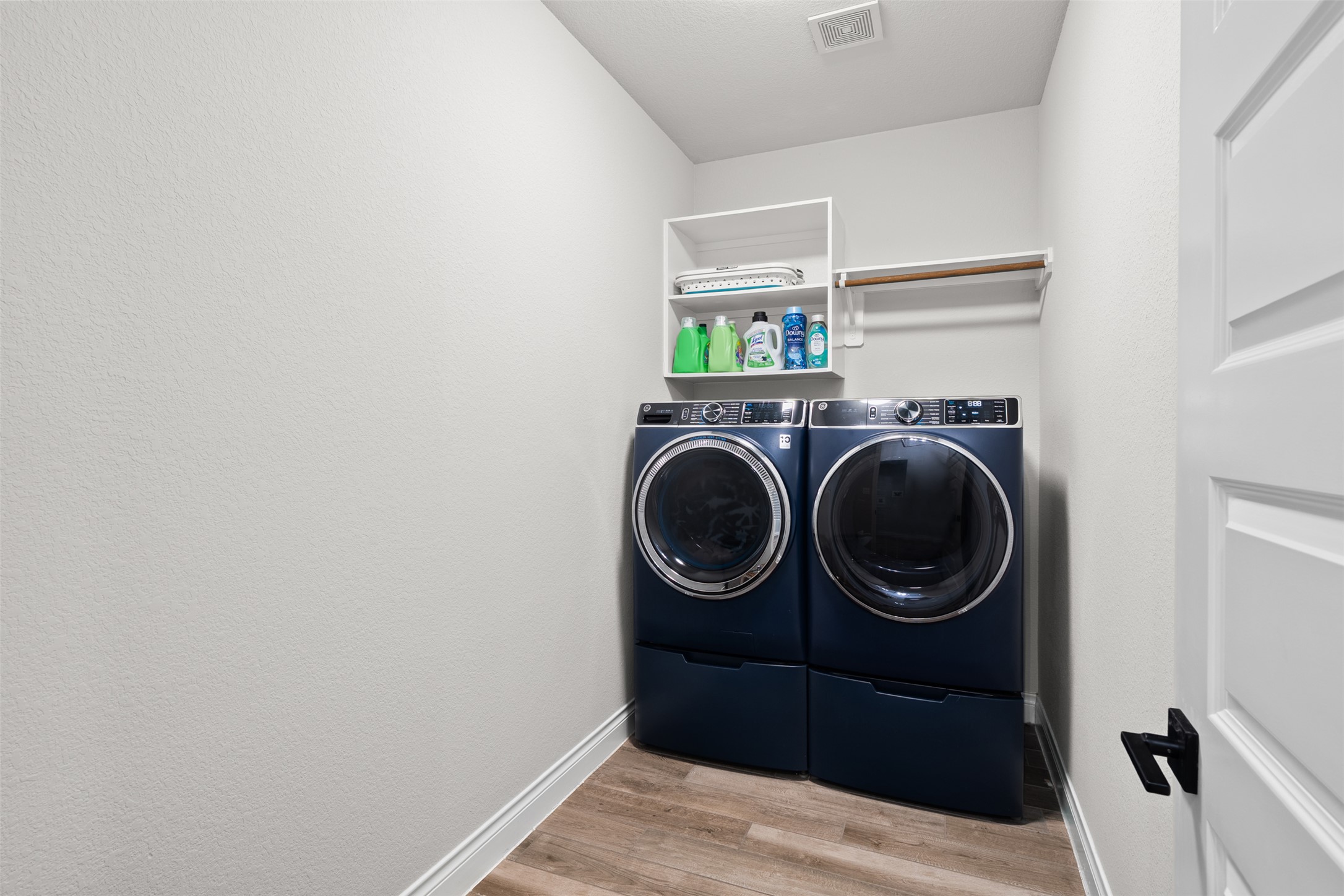 341 Pisa Lane Georgetown, TX 78628 - Photo 29 of 31 a view of a bedroom with washer and dryer