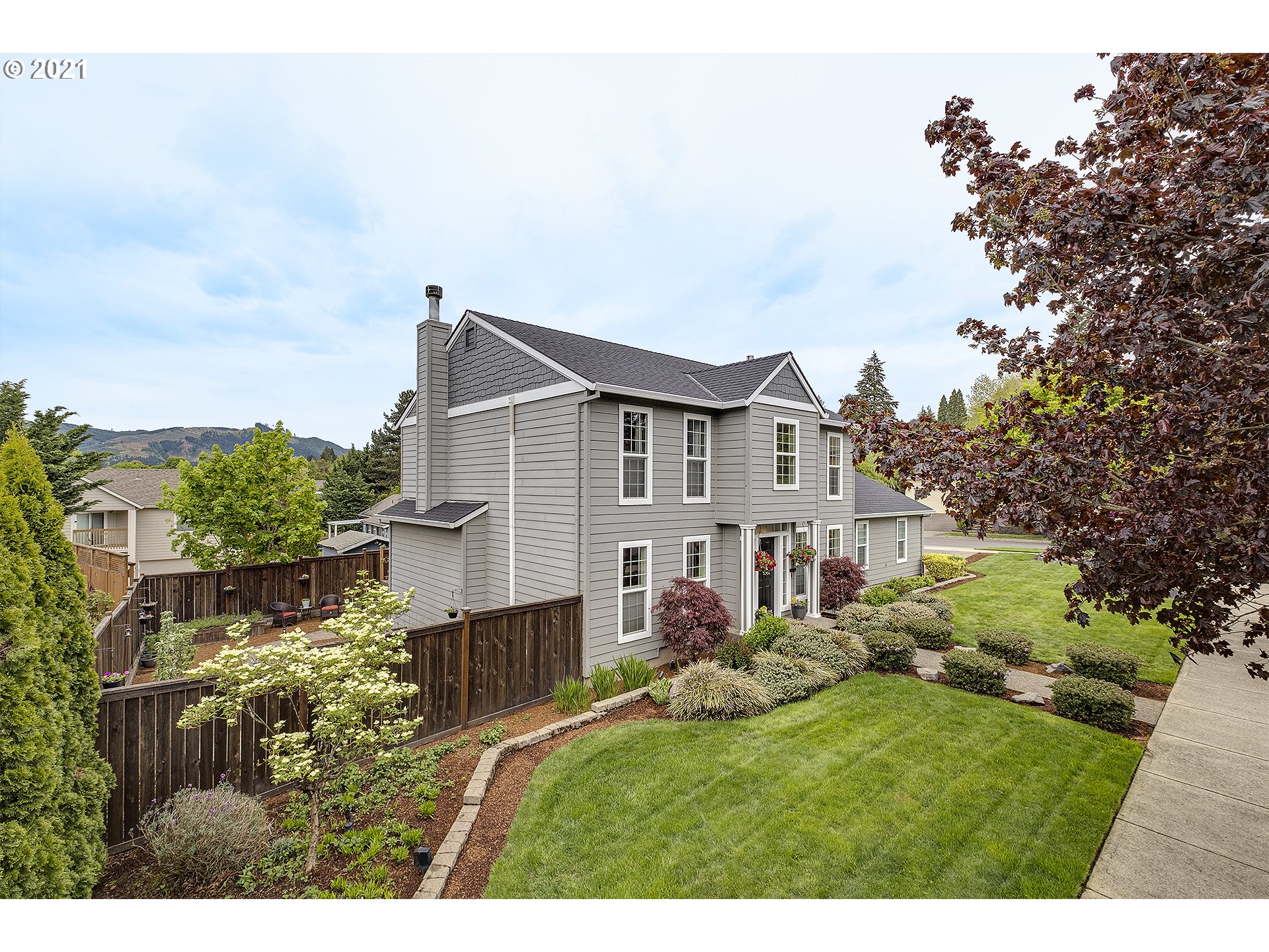 716 Roxe Drive Forest Grove, OR 97116 - Photo 2 of 32 a aerial view of a house with a yard