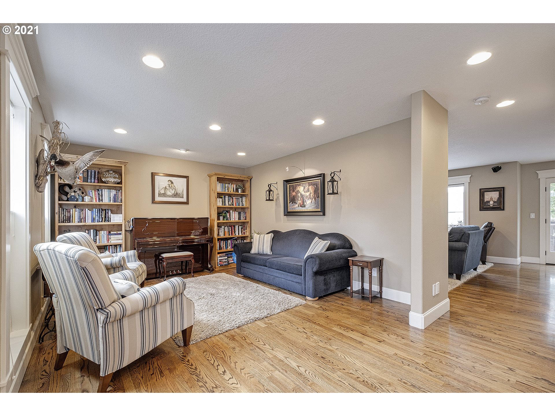 716 Roxe Drive Forest Grove, OR 97116 - Photo 7 of 32 a living room with furniture and a wooden floor