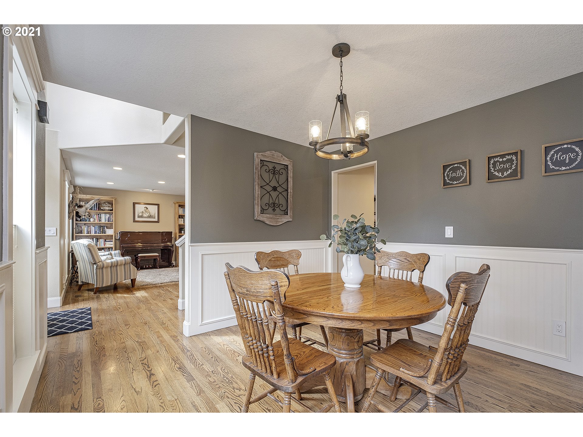 716 Roxe Drive Forest Grove, OR 97116 - Photo 8 of 32 a view of a dining room with furniture and chandelier
