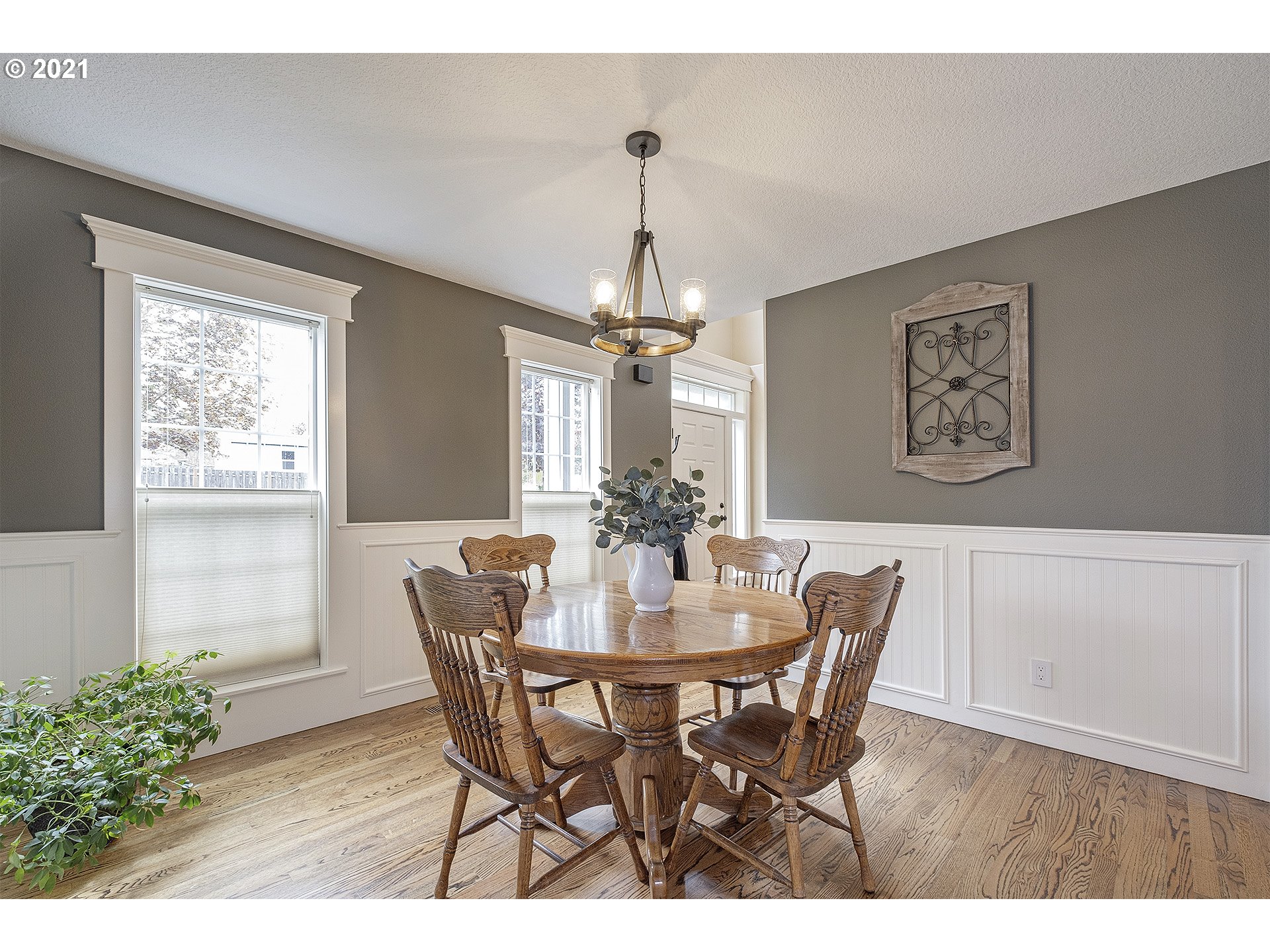 716 Roxe Drive Forest Grove, OR 97116 - Photo 9 of 32 a dining room with furniture a chandelier and window