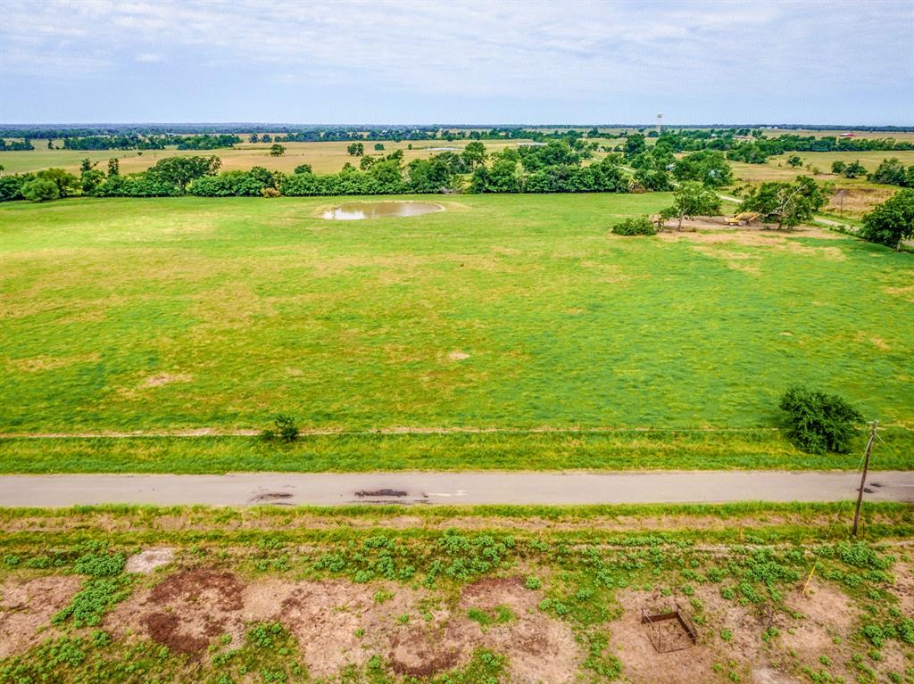 Lot 7 Spring Ranch Sulphur Springs, TX 75482 - Photo 11 of 13 a view of an ocean and a yard