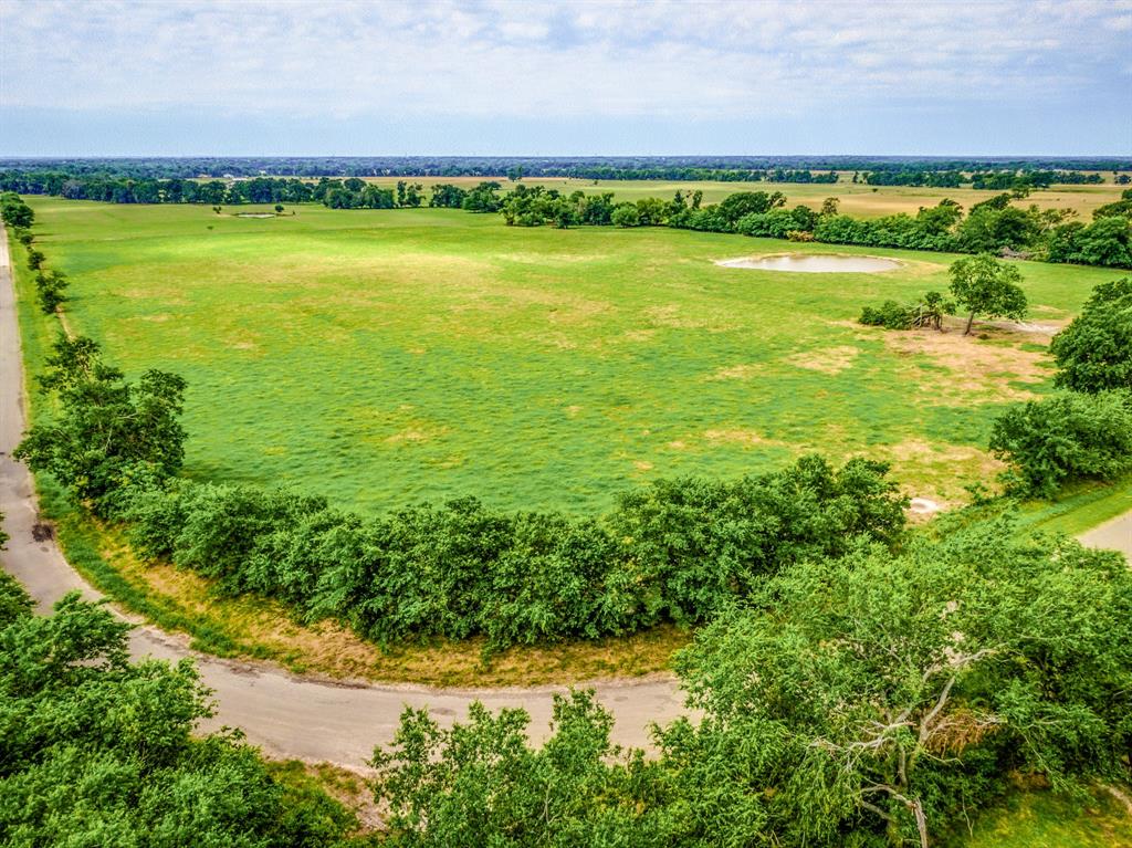 Lot 7 Spring Ranch Sulphur Springs, TX 75482 - Photo 13 of 13 a view of a city with an ocean beach