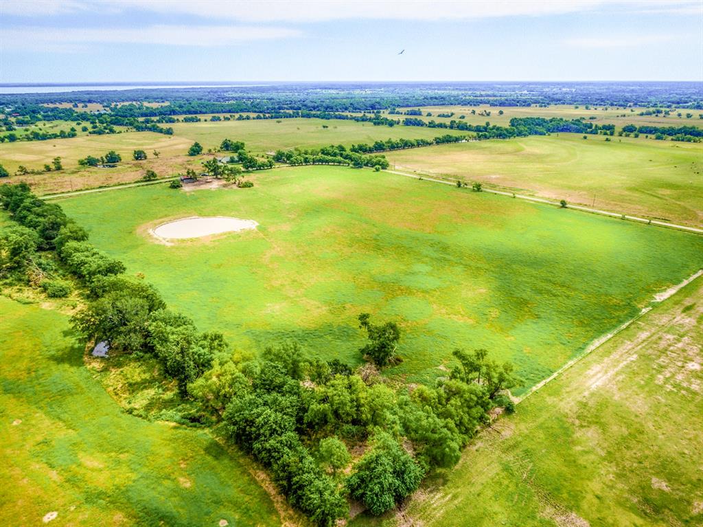 Lot 7 Spring Ranch Sulphur Springs, TX 75482 - Photo 7 of 13 a view of an ocean and a city