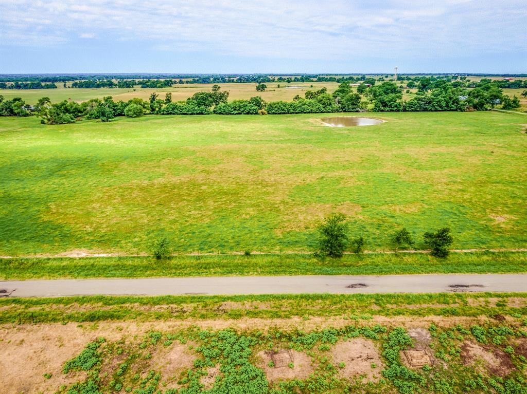 Lot 7 Spring Ranch Sulphur Springs, TX 75482 - Photo 9 of 13 a view of an ocean and a yard