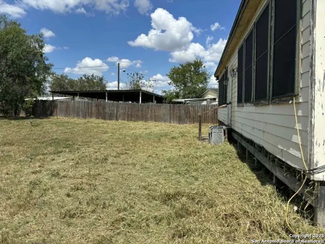 a view of a lake with a house