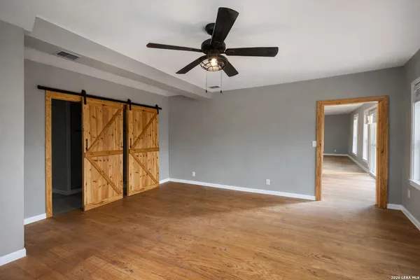 a view of an empty room and window