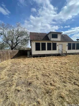 a front view of house with yard
