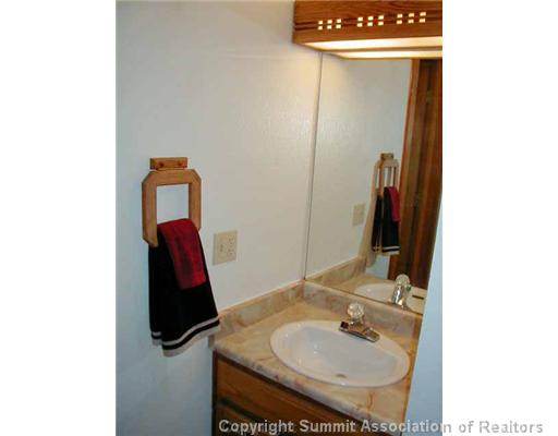 9401 Ryan Gulch Road, Unit 402 Silverthorne, CO 80498 - Photo 10 of 12 Bathroom.