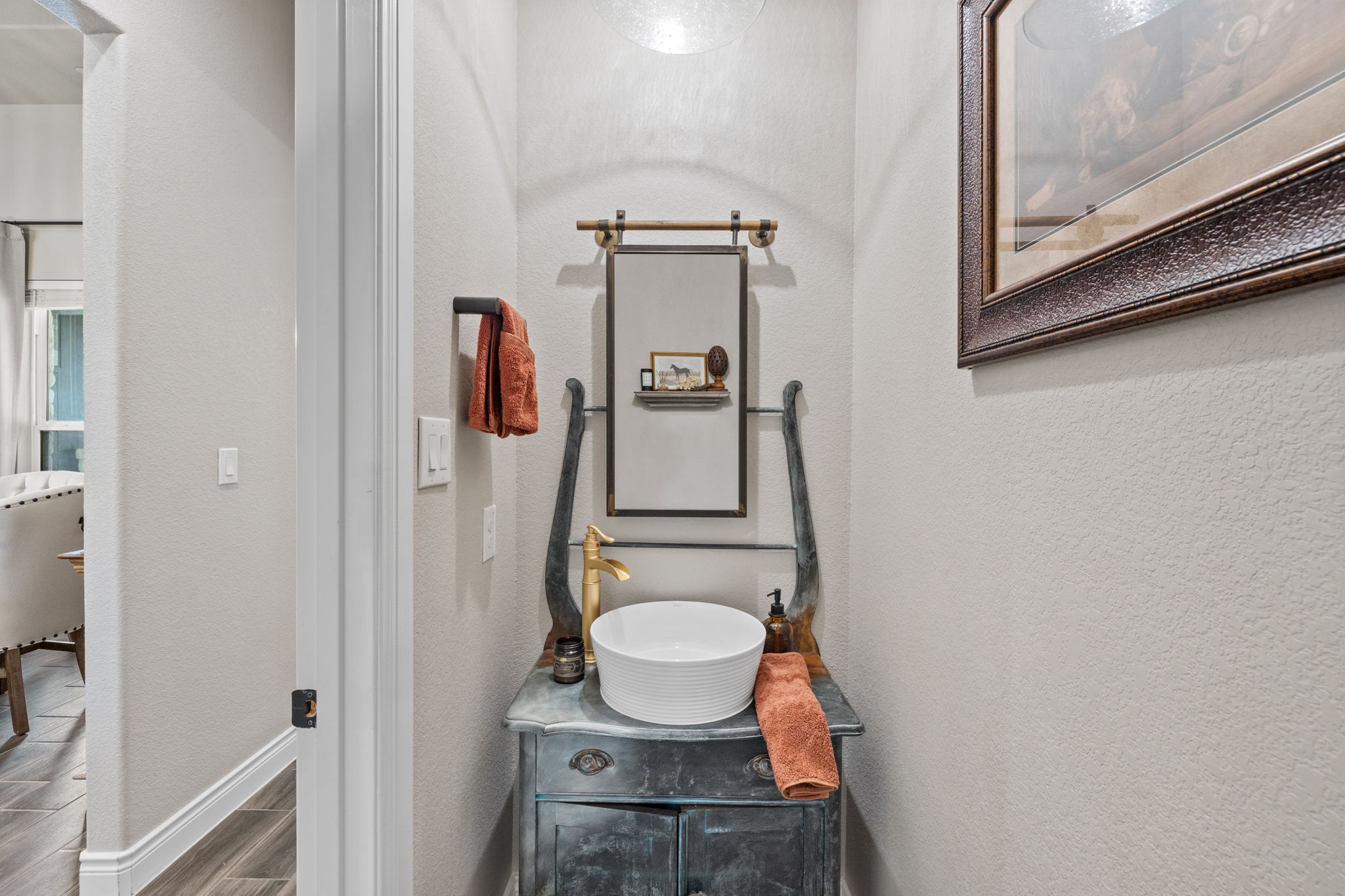 104 Lower Cedar Cove Georgetown, TX 78633 - Photo 23 of 37 a bathroom with a toilet and a sink