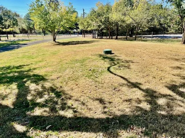 a view of yard with trees
