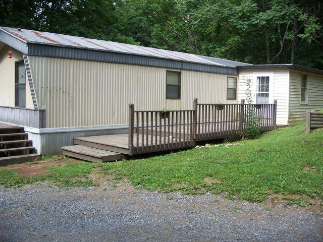 a view of a backyard with a garden