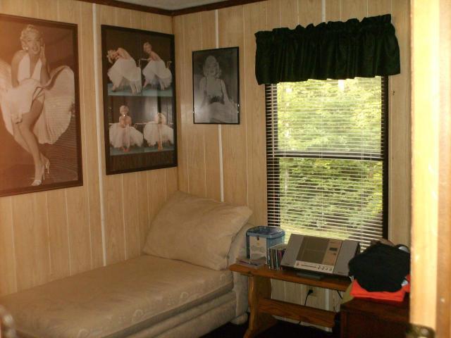 1725 Porters Mountain Road Blue Ridge, VA 24064 - Photo 11 of 13 a bedroom with a bed and a window