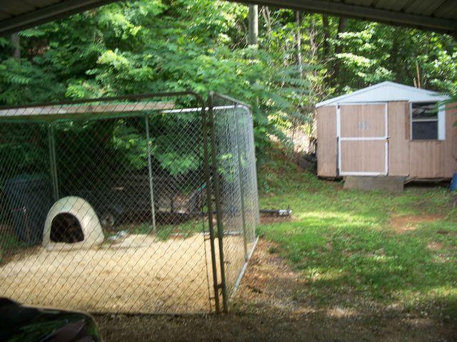 1725 Porters Mountain Road Blue Ridge, VA 24064 - Photo 5 of 13 a backyard of a house with yard and outdoor seating
