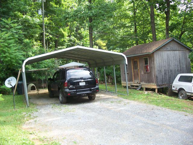 1725 Porters Mountain Road Blue Ridge, VA 24064 - Photo 6 of 13 a view of backyard with a car parked in it