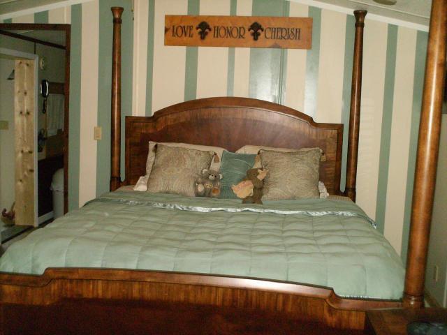 1725 Porters Mountain Road Blue Ridge, VA 24064 - Photo 8 of 13 a bed sitting in a bedroom next to a window