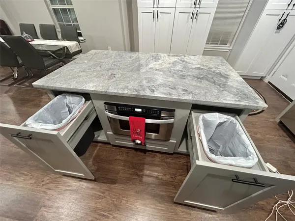 a utility room with washer and dryer