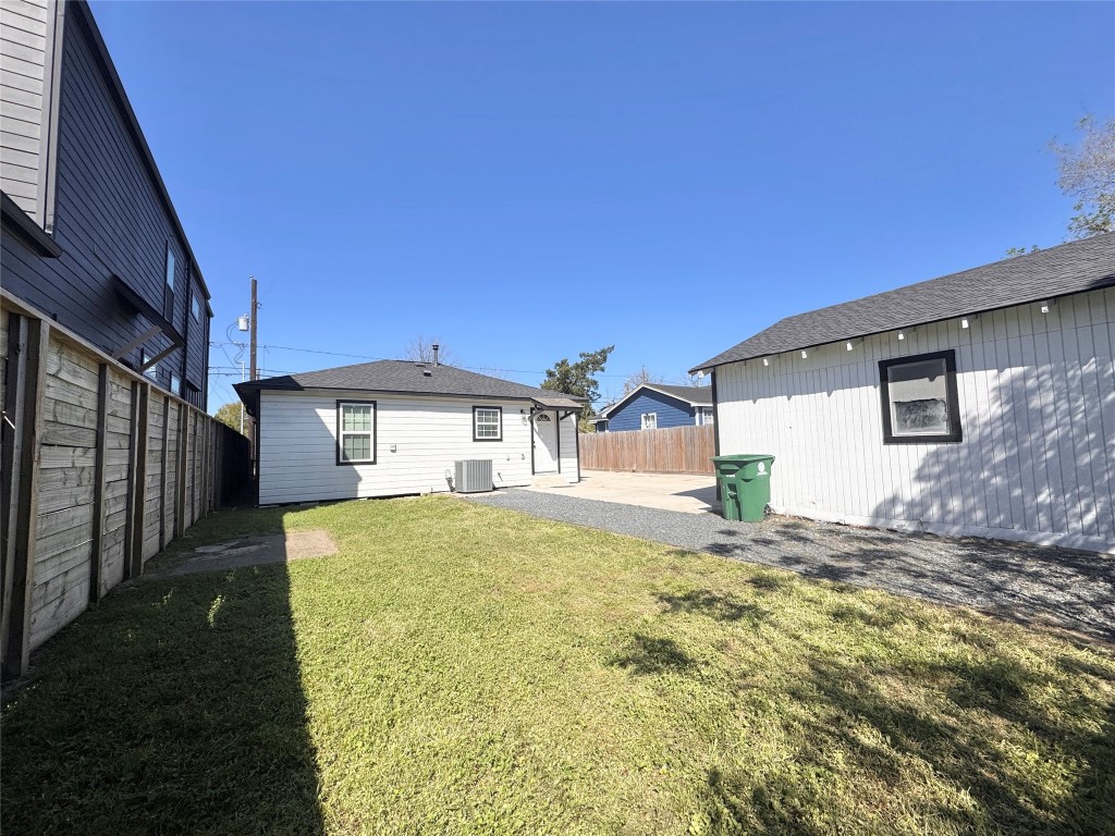 4010 Chapman Street Houston, TX 77009 - Photo 22 of 22 a view of a house with a yard and garage