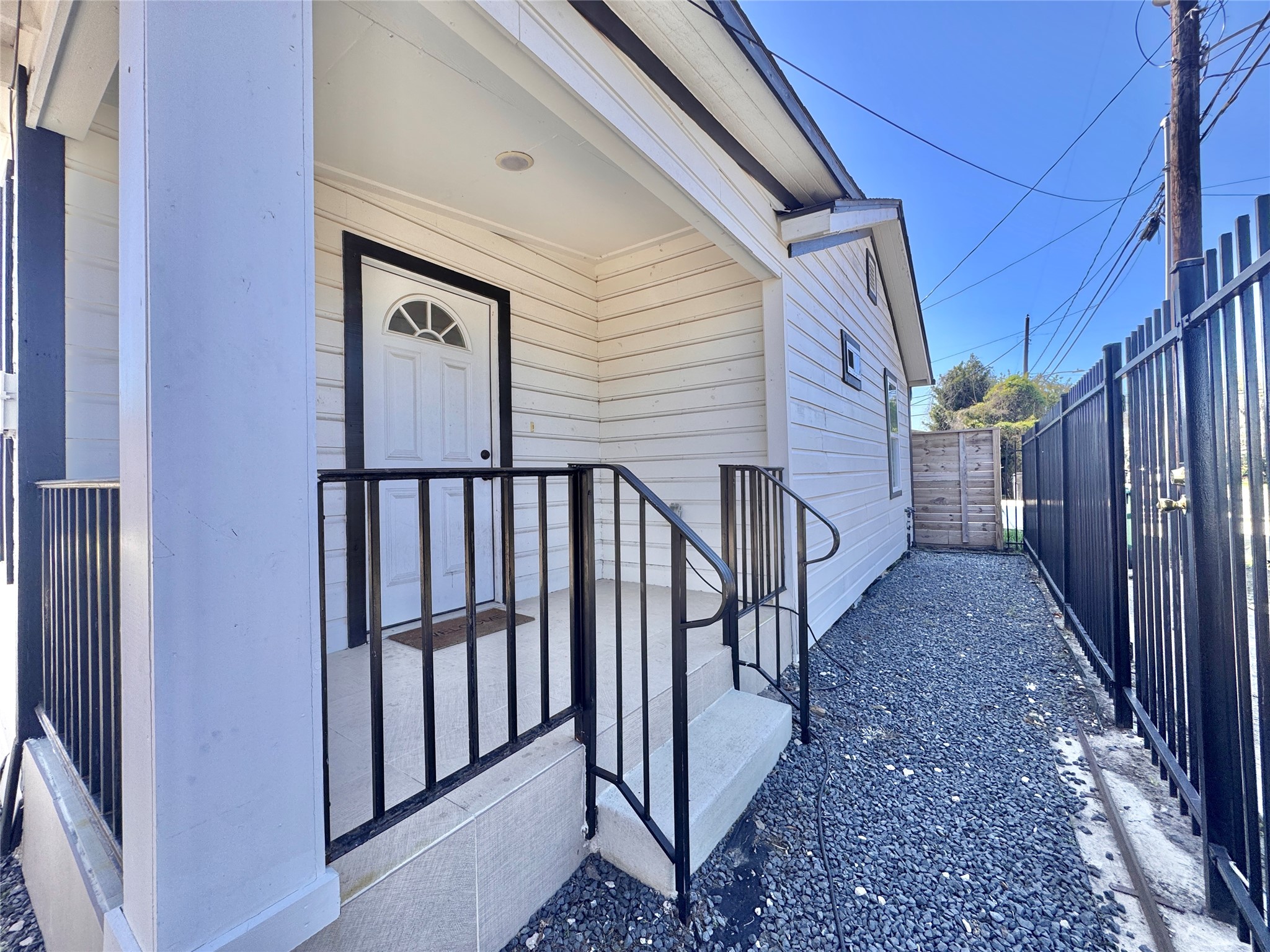 4010 Chapman Street Houston, TX 77009 - Photo 4 of 22 a view of a house with wooden stairs