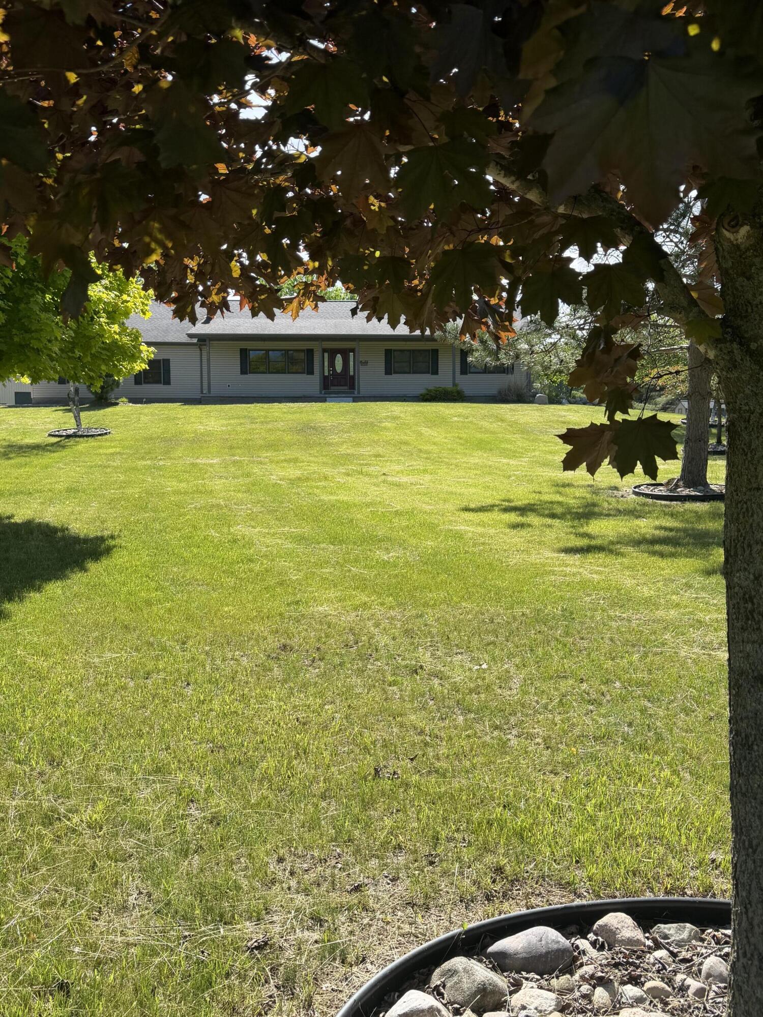 1595 South Poor Farm Road Mikado, MI 48745 - Photo 1 of 78 1595 full front June