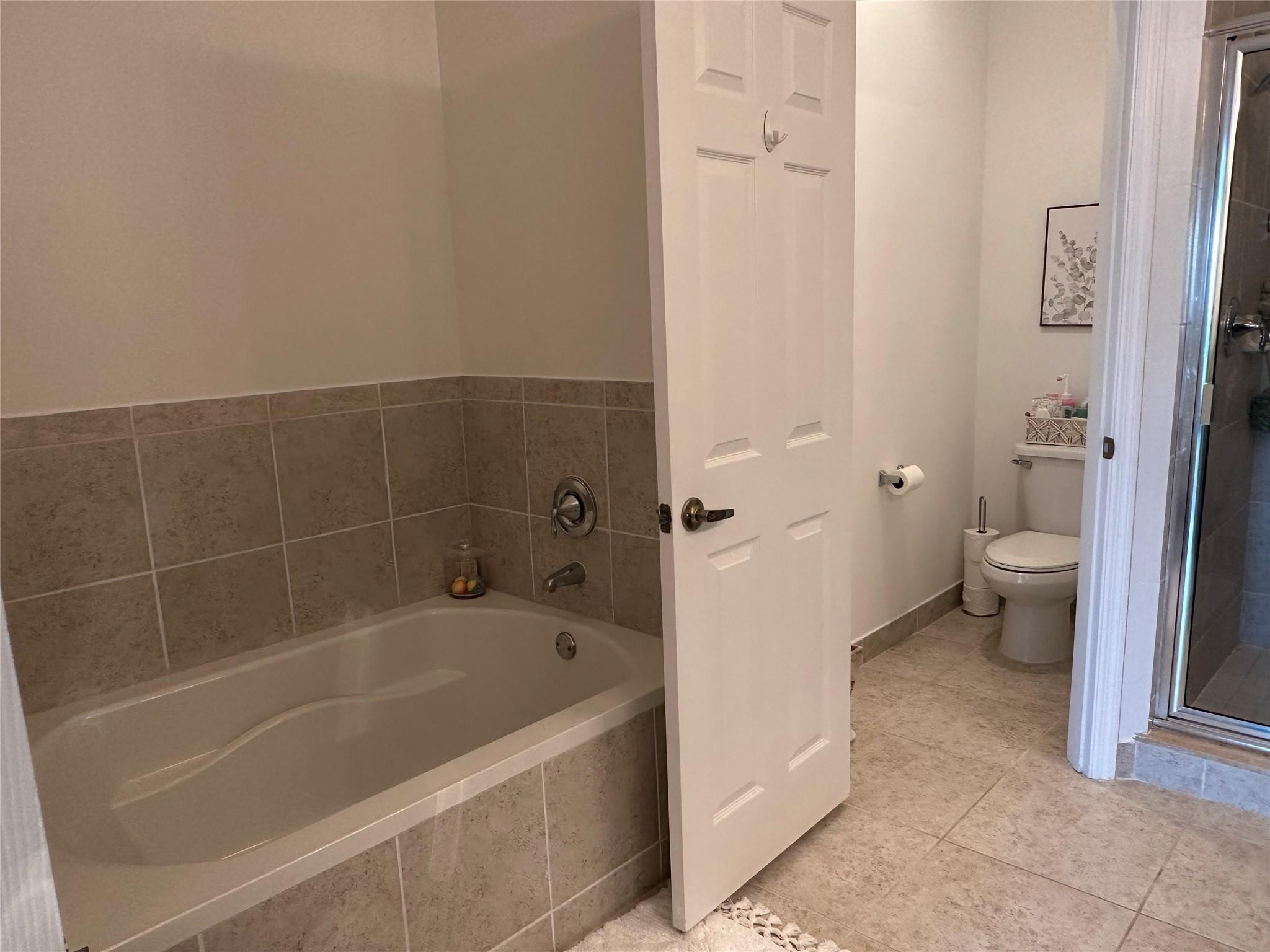 2854 Southwest 119th Road, Unit 2854 Miramar, FL 33025 - Photo 27 of 43 Master Bathroom Tub & Toilet Room