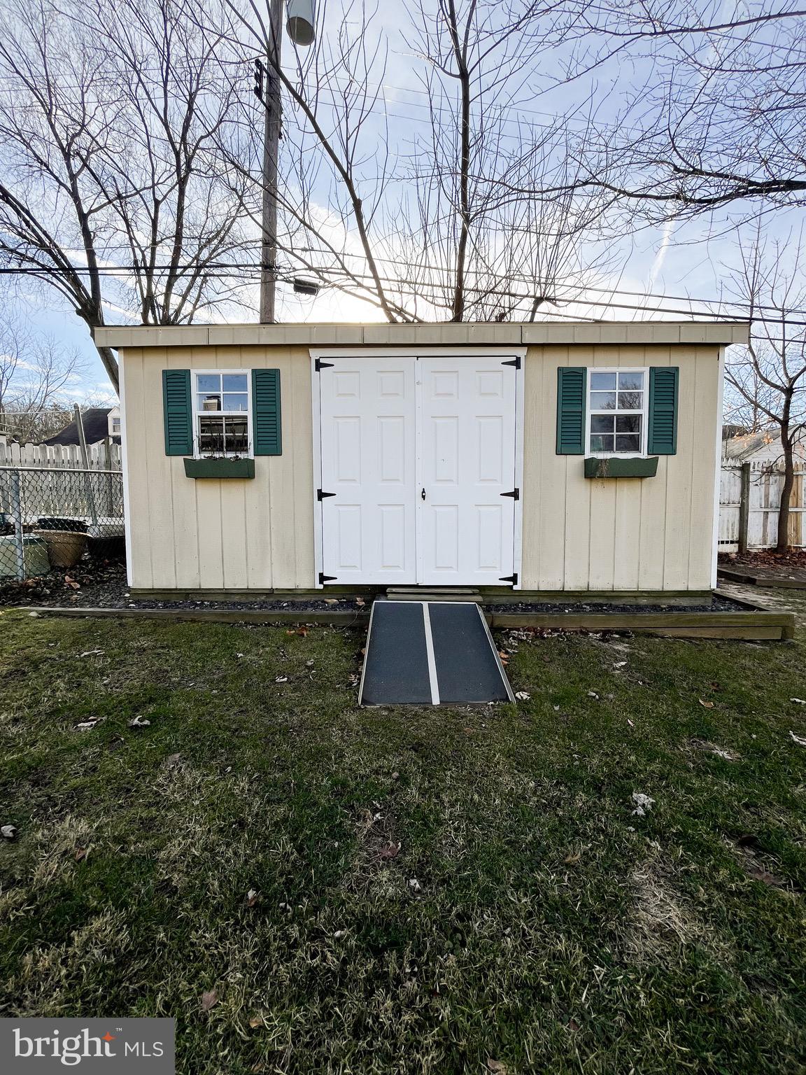 2314 Triebel Road Abington, PA 19001 - Photo 15 of 16 a view of a white house in the middle of a yard