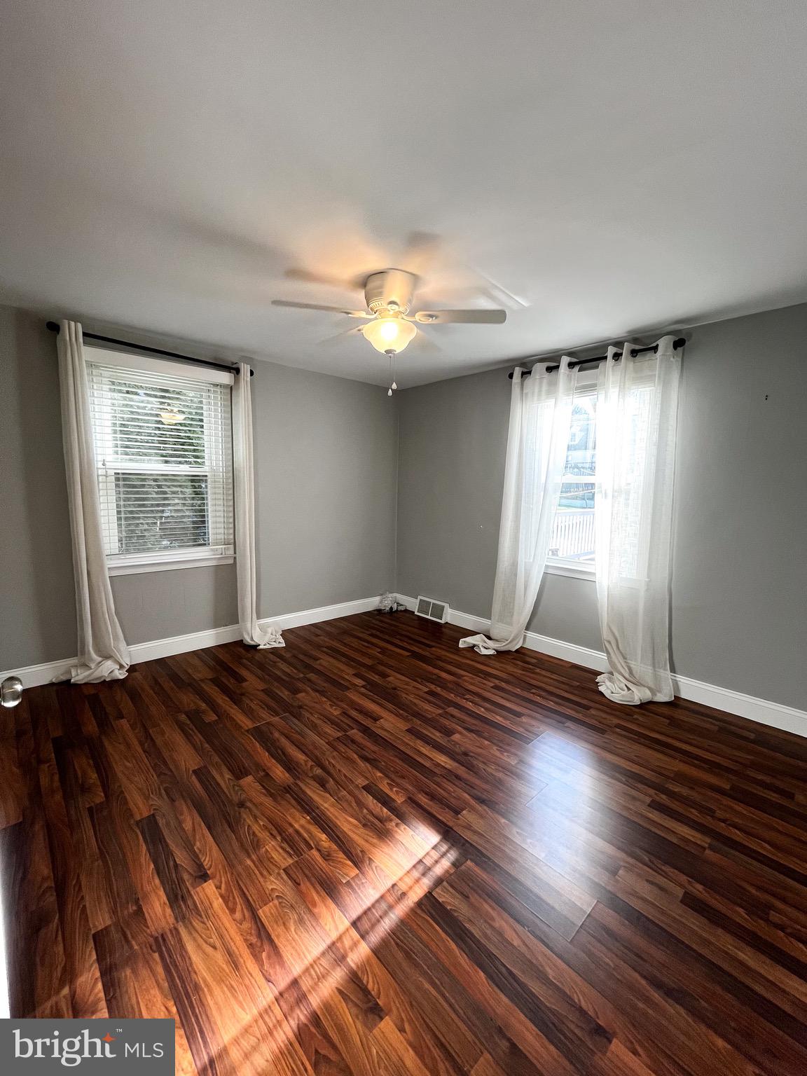2314 Triebel Road Abington, PA 19001 - Photo 7 of 16 a view of empty room with wooden floor and fan