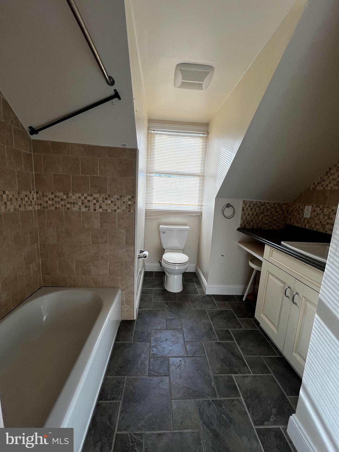 2314 Triebel Road Abington, PA 19001 - Photo 10 of 16 a bathroom with a bathtub and a toilet