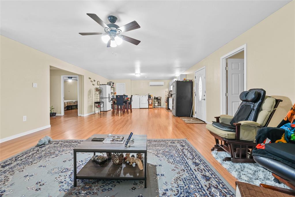 447 Masthead Road Gun Barrel City, TX 75156 - Photo 18 of 27 a dining room with furniture and wooden floor