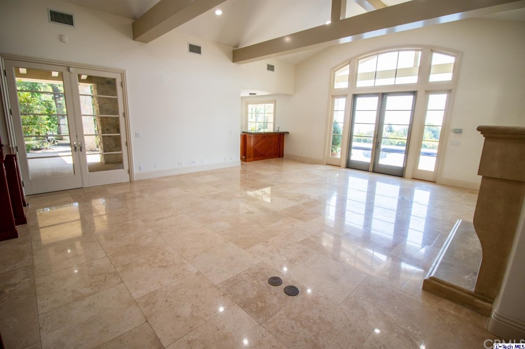 12801 Chalon Road Los Angeles, CA 90049 - Photo 23 of 77 a view of an empty room with a window