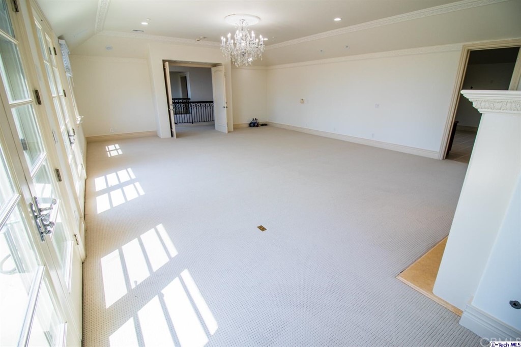 12801 Chalon Road Los Angeles, CA 90049 - Photo 33 of 77 a view of an empty room with a window