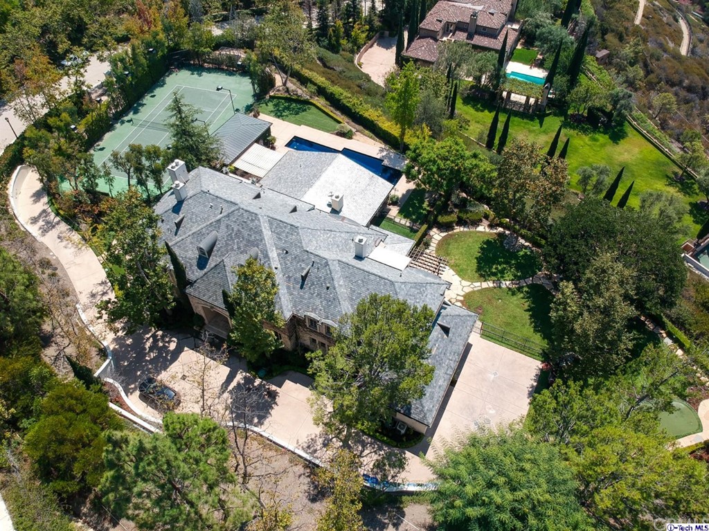 12801 Chalon Road Los Angeles, CA 90049 - Photo 73 of 77 an aerial view of a house with a yard