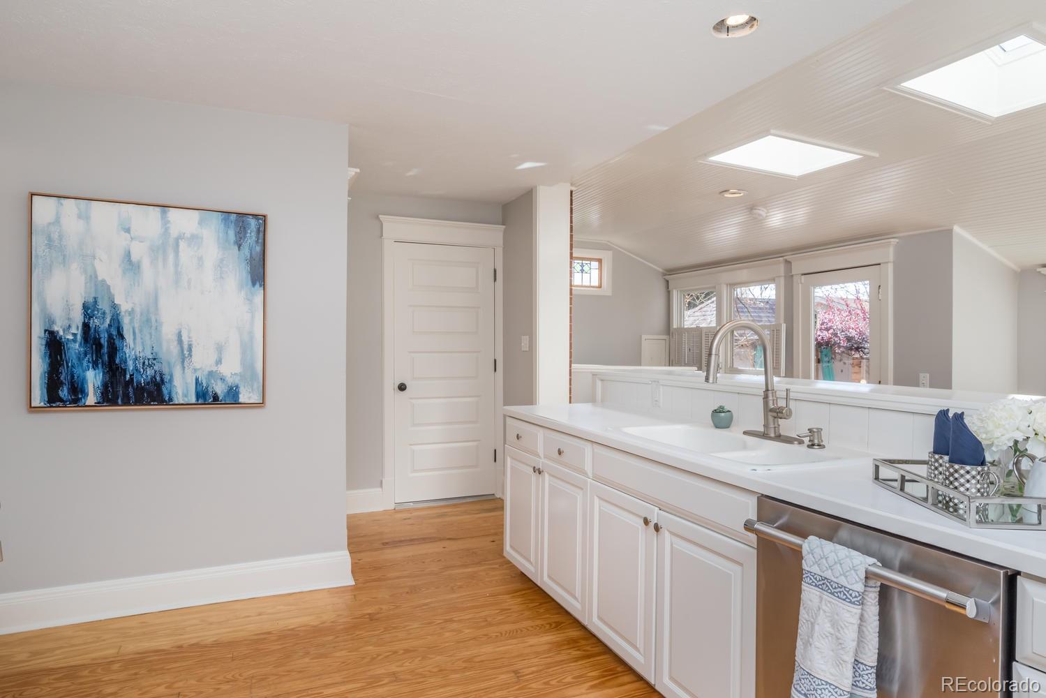 2120 Mapleton Avenue Boulder, CO 80304 - Photo 13 of 29 a bathroom with a double vanity sink and a mirror