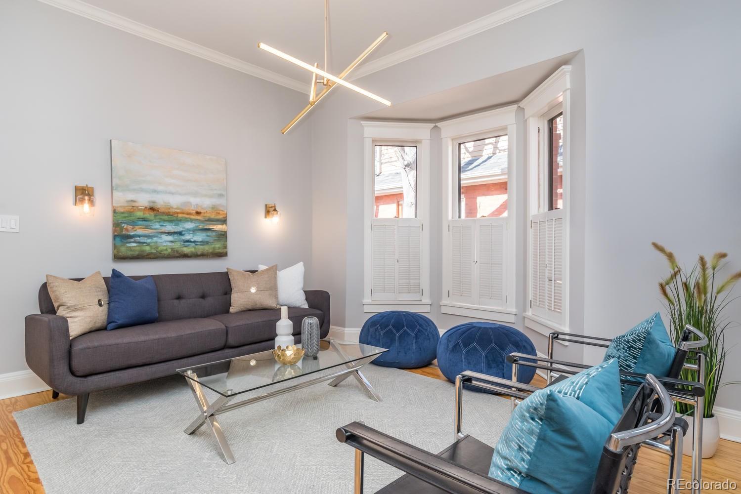 2120 Mapleton Avenue Boulder, CO 80304 - Photo 7 of 29 a living room with furniture and a large window