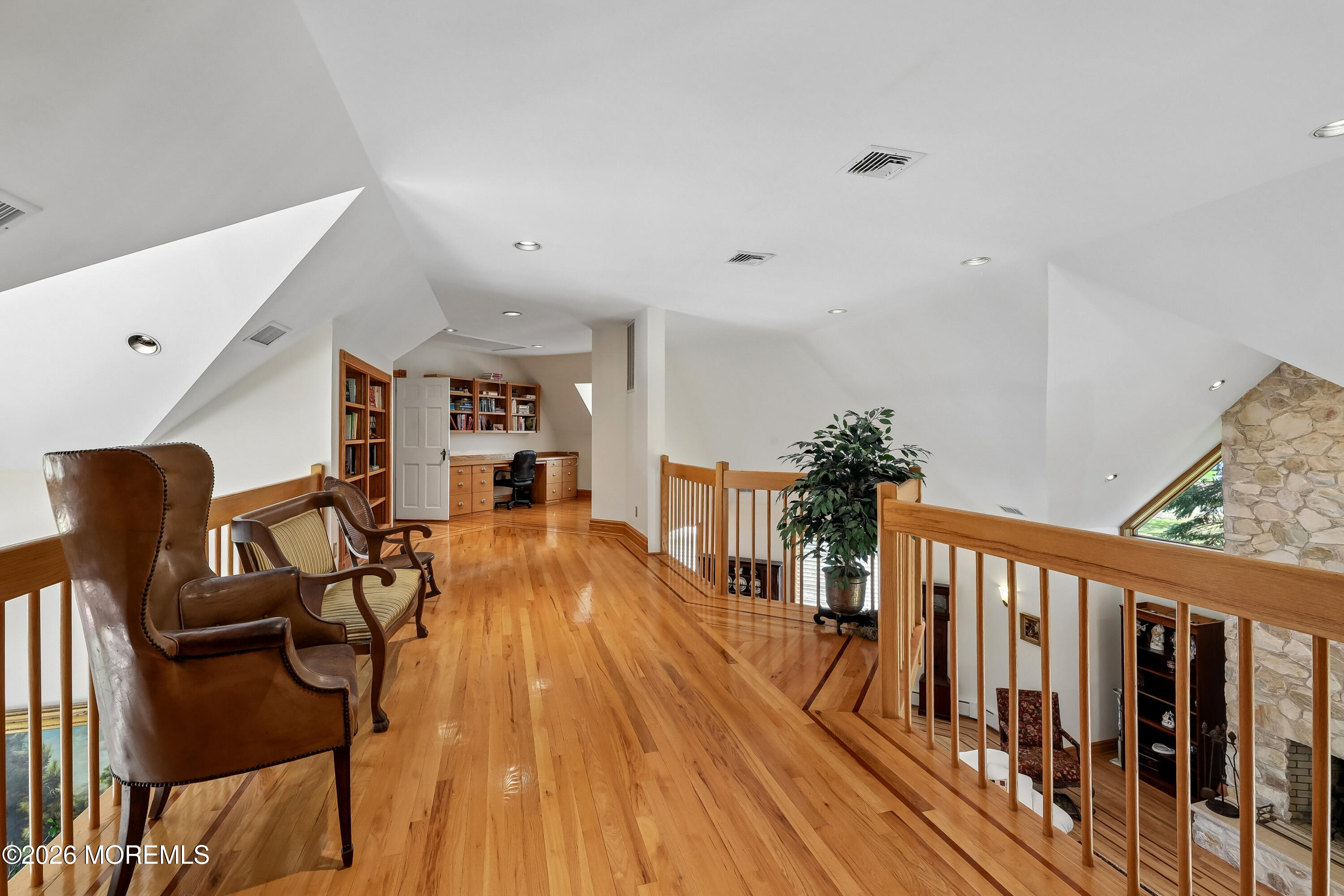 187 Hockhockson Road Colts Neck, NJ 07722 - Photo 45 of 55 a view of a livingroom with furniture and wooden floor