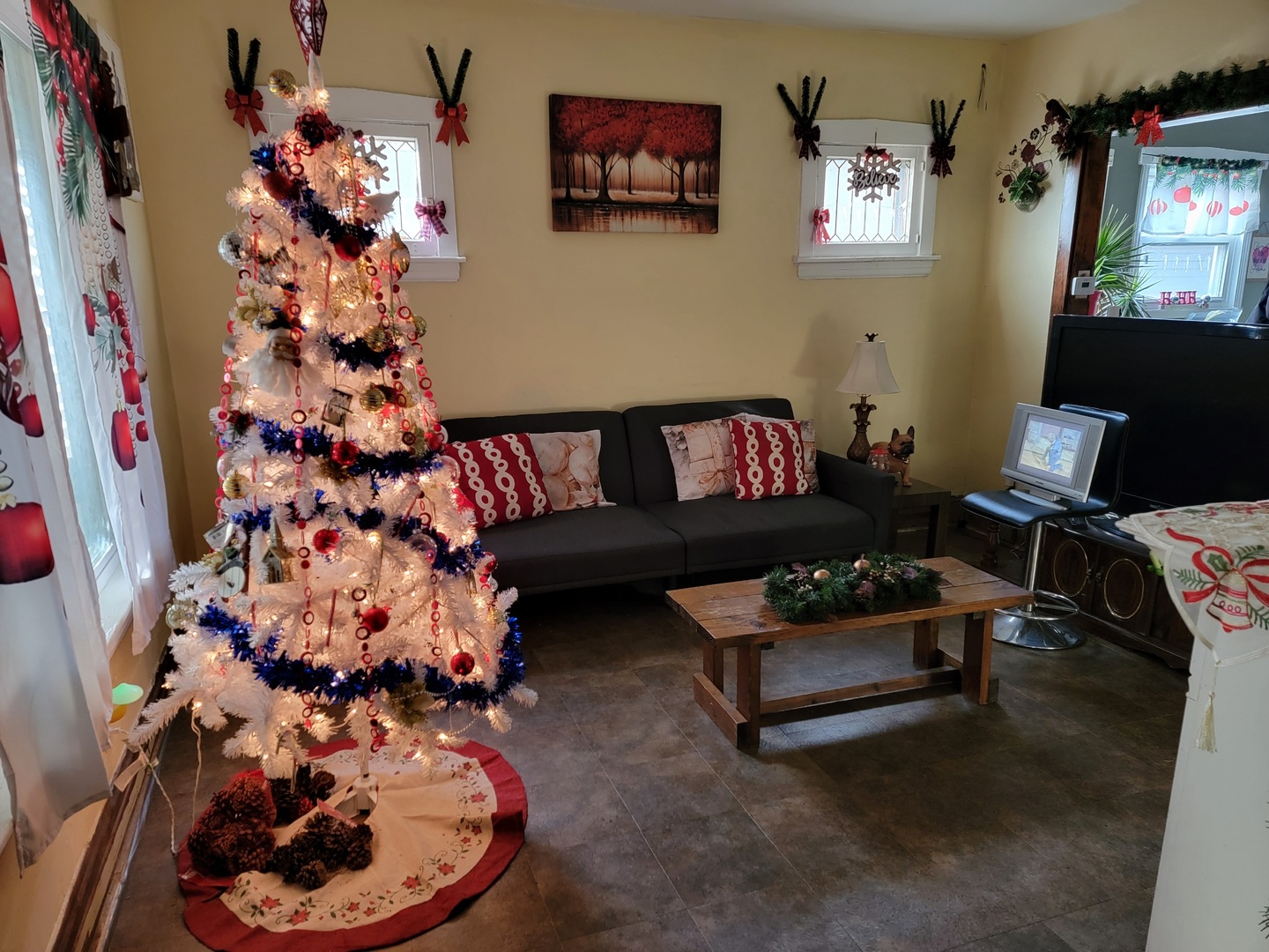 2124 South 3rd Avenue Maywood, IL 60153 - Photo 5 of 26 a living room with furniture and a painting on the wall