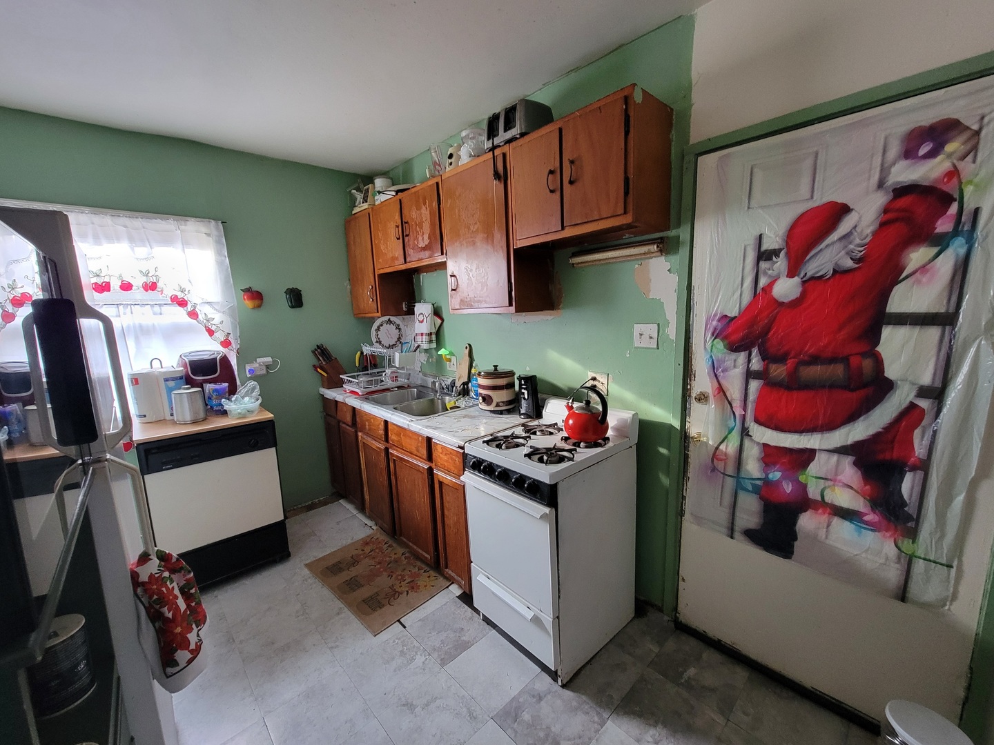 2124 South 3rd Avenue Maywood, IL 60153 - Photo 10 of 26 a kitchen with granite countertop a stove and cabinets