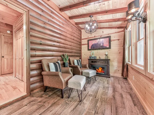 a outdoor living space with lots of furniture and wooden floor