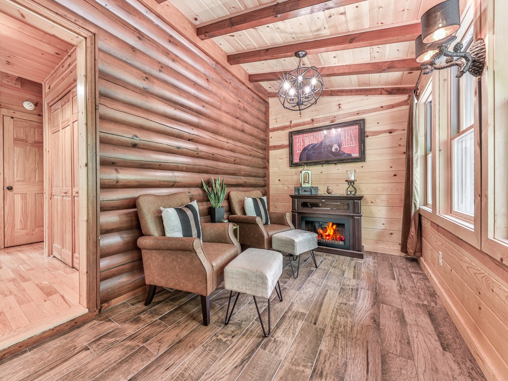 34 Amber Way Morganton, GA 30560 - Photo 15 of 39 a outdoor living space with lots of furniture and wooden floor