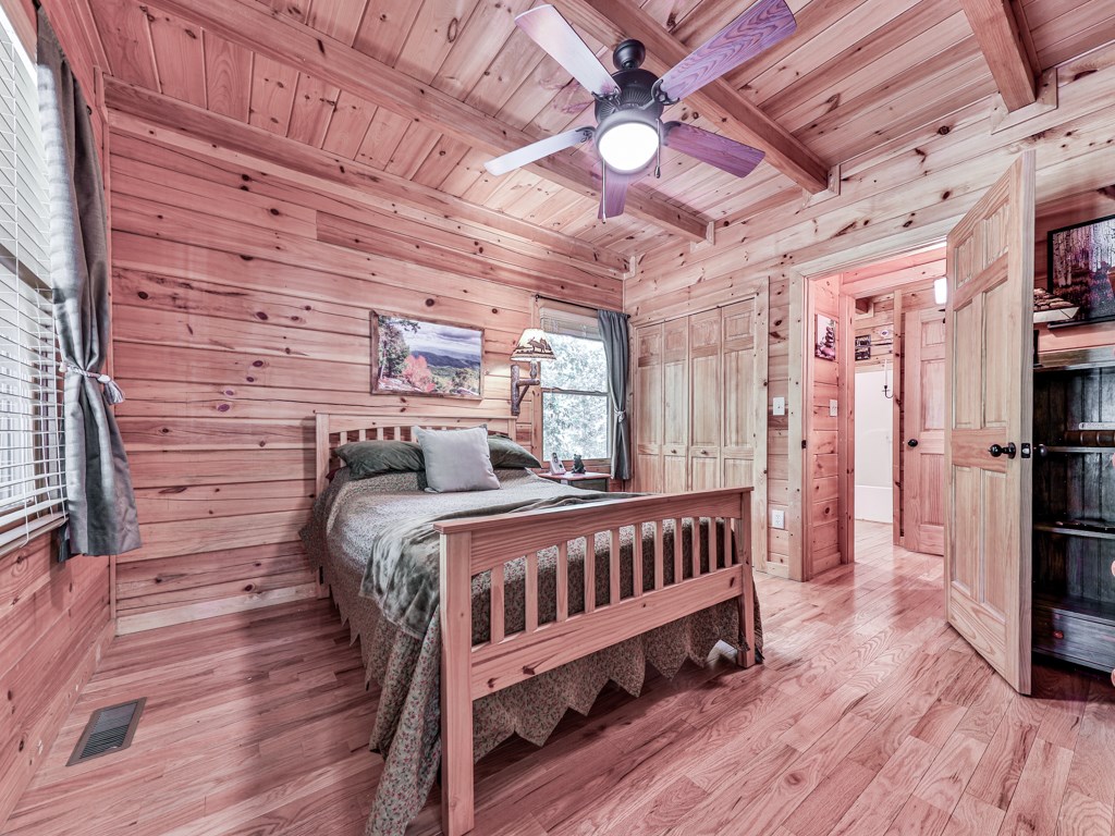 34 Amber Way Morganton, GA 30560 - Photo 17 of 39 a bedroom with furniture and wooden floor