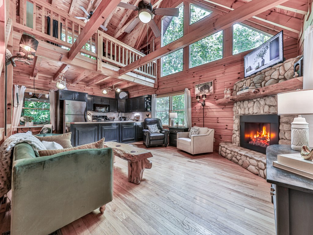 34 Amber Way Morganton, GA 30560 - Photo 2 of 39 a living room with furniture and a fireplace