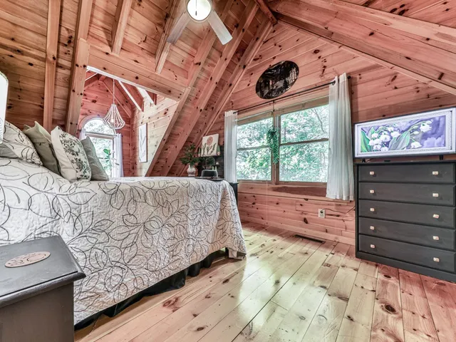 a view of a kitchen with furniture and windows